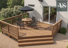 a wooden deck with chairs and an umbrella