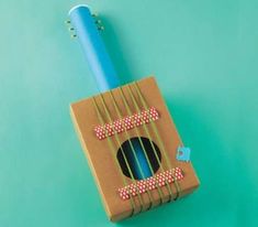 a blue toothbrush sitting on top of a cardboard box