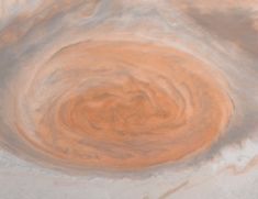 an orange and white swirl in the sky