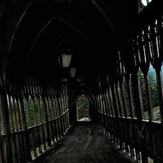 an old wooden bridge with lots of windows