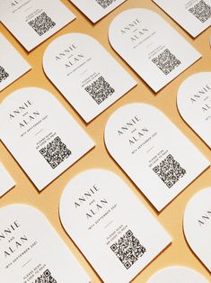 many business cards with qr code printed on them are arranged in the shape of circles