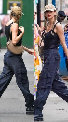 two women in overalls walking down the street