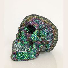 Handmade Green Flare Rhinestone Skull The Green Flare Rhinestone Skull is Handmade to order using the finest Plaster of Paris.  It is then covered, by hand, with over 3000 Rhinestones.  Although it takes a long time to do and requires a LOT of patience, the end result is totally worth it! Skull Dimensions (approx) Width : 14 cm Height : 15cm Depth : 20cm Weight : 2 kg This Skull is handmade to order. Each Rhinestone is hand glued by myself and therefore it can take up to 2 weeks for a custom Rhinestone Skull to be completed and dispatched. Once your order has been completed and shipped I will notify you via email. It is possible to do the Rhinestone skull in other Rhinestone colours - please email me if you would like a different colour and I will check if the colours are available. PLEASE Rhinestone Skull, Skull Accessories, Handmade Skulls, Acrylic Spray Paint, Plaster Of Paris, Red Skull, Skull Decor, Black Skulls