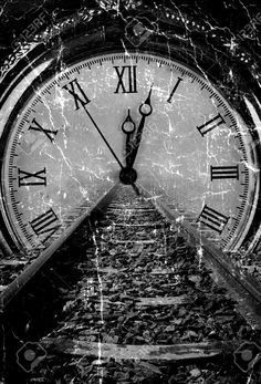 an old clock with roman numerals is shown in black and white, as if it were taken from the ground