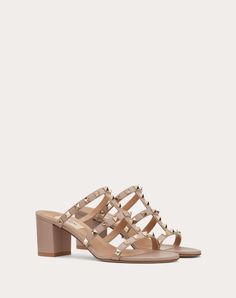 Valentino Garavani Rockstud calfskin leather sandal. - Platinum-finish studs - Heel height 60 mm/2.4” - Made in Italy Studded Heels, Leather Slide Sandals, Valentino Rockstud, All About Shoes, Boutique Online, Leather Slides, Online Boutiques, Slide Sandals, Valentino Garavani