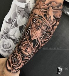 a man's arm with a clock and roses tattoo on the left side of his arm