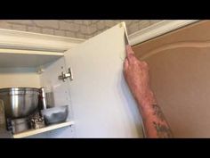 Kitchen Makeover Part 1 - Removing the Wrap From Kitchen Cabinets - YouTube How To Update Laminate Kitchen Cabinets, Remove Laminate From Cabinets, Removing Laminate From Cabinets, How To Vinyl Wrap Kitchen Cabinets, Vinyl Wrap Kitchen Cabinets, How To Restrain Kitchen Cabinets, Vinyl Wrap Kitchen, Kitchen Wrap