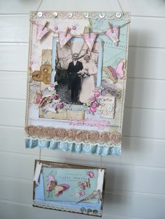 an altered picture hanging on a wall next to a frame with pictures and ribbons around it