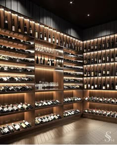 the wine cellar is filled with many bottles