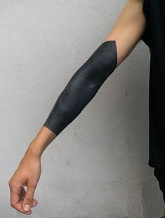 the arm is covered with black paint