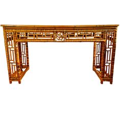 a wooden table with an intricate design on it's top and bottom shelf, against a white background