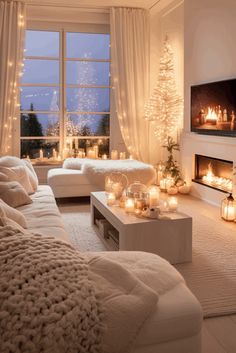 a living room filled with lots of white furniture and christmas lights on the windowsill