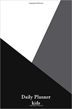 the cover of daily planner for kids with black and white squares on it, in front of