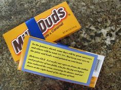 two candy bars sitting on top of a granite counter