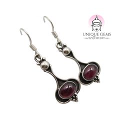 UNIQUE EXCLUSIVE ART NOUVEAU EARRINGS RED GARNET IN 925 STERLING SILVER 6.8 CARAT IN JEWELER'S QUALITY * Unique Gems Art Nouveau Red Garnet Drop Earrings ~ Jeweler's Quality * Solid 925 sterling silver, stamped 925 and nickel-free, hypoallergenic, suitable for allergy sufferers * Dimensions 4cm x 1.2cm x 0.6cm ~ Weight 6.8 carats / 4.5 grams ~ Cut Cabochon * Quality from the German retailer ~ Finest Jewelry by Unique Gems with elegant logo velvet bag * Garnet increases self-confidence, resilienc Silver Garnet Earrings For Formal Occasions, Classic Silver Garnet Earrings, Garnet Gemstone Earrings, Classic Silver Ruby Earrings, Classic Garnet Jewelry Stamped 925, Formal Garnet Jewelry Stamped 925, Garnet Drop Earrings, Art Nouveau Earring, Garnet Crystal