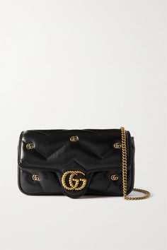 'Marmont' is one of Gucci's most iconic collections, so naturally, every new addition creates a lot of buzz. This mini '2.0' shoulder bag has been made in Italy from supple matelassé leather and is detailed with twisted and micro versions of the label's 'GG' logo. The interior will easily hold a wallet and phone. Gucci Rectangular Shoulder Bag With Gold-tone Logo, Gucci Rectangular Bag With Gold-tone Logo Plaque, Luxury Gucci Bag With Gold-tone Logo Plaque, Gucci Super Mini, Gucci Marmont Bag, Gucci Marmont, Gucci Gg Marmont, Closet Organizer, Gg Logo