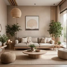 a living room filled with furniture and potted plants