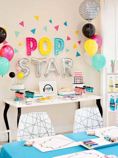 a pop star themed party with balloons and decorations