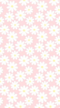 a pink background with white daisies and yellow dots on the bottom half of it