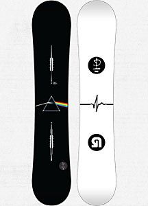 a snowboard with the dark side of the moon on it's bottom half