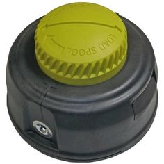 an image of a yellow knob on top of a black object with the words toots n'o written on it