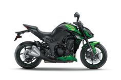 a green and black motorcycle on a white background