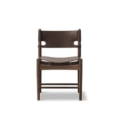 a wooden chair with leather upholstered back and seat, viewed from the front