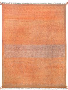 an orange and grey rug with fringes on the bottom, in front of a white background