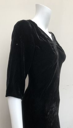 "This is a beautiful black velvet gown dating from the 1930's. It's a very flattering design with an open back. The dress is cut on the bias and has short sleeves. The velvet is very soft and fine. The overall condition is good though not perfect. There are some small holes on each sleeve and also towards the bottom of the dress. There are some seam repairs on the underarm areas. I've priced this piece according to condition. It's a really beautiful dress and looks great on. Bust 32\"-34\" Waist Black Velvet Gown, Velvet Gown, Pink Gowns, The Velvet, Silk Velvet, Not Perfect, Silk Chiffon, Beautiful Dress, Black Velvet