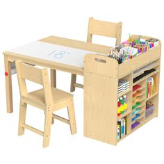 a child's table and chair set with an easel, pencils and markers