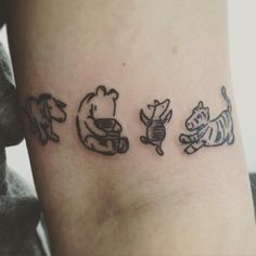 the tattoo on the arm shows three different animals