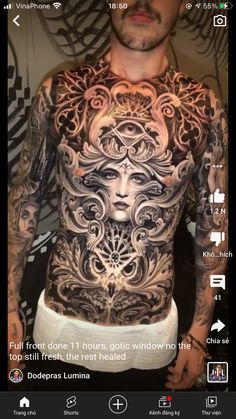 a man with tattoos on his body and chest