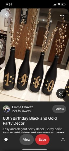 four black and gold bottles with numbers on them