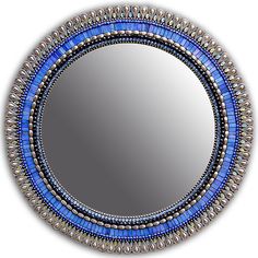 a round mirror with beaded trim around the edges and blue beads on the edge