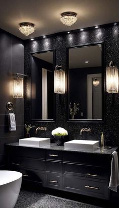 a black and white bathroom with two sinks