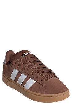 Suede leather adds a classic touch to this tennis-inspired sneaker with modern tech to keep you moving comfortably from day to day. Leather and synthetic upper/textile lining/rubber sole Imported Adidas Brown Sneakers With Contrast Sole, Brown Adidas Sneakers With Branded Insole, Brown Leather Adidas Sneakers, Brown Adidas Low-top Sneakers, Brown Low-top Adidas Sneakers, Classic Brown Adidas Sneakers, Brown Canvas Sneakers With Gum Sole, Brown Adidas Sneakers, Adidas Canvas Low-top Sneakers