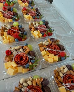 several plastic containers filled with different types of food