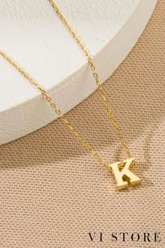 Minimalist Gold Initial Pendant Necklace - Dainty Personalized Letter k Necklace Perfect Gift For Her -Mom Gift - Birthday Gift For Her

✨ Elevate your style with the timeless elegance of our Minimalist Gold Initial Pendant Necklace. Featuring a delicate letter K pendant, this dainty necklace is the perfect personalized gift for moms, birthdays, or any special occasion. Crafted from high-quality materials, it adds a touch of sophistication to any outfit. Whether worn alone or layered with other pieces, this necklace exudes effortless luxury and personalized charm. 💫 Letter K Necklace, K Pendant, K Necklace, Gold Initial Pendant, Initial Pendant Necklace, Letter K, Personalized Gifts For Mom, Gold Initial, Birthday Gift For Her