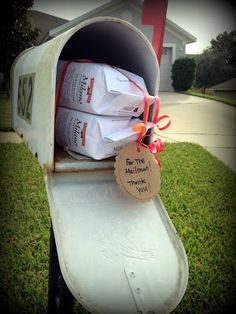 a mailbox that has some bags in it