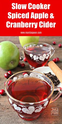 slow cooker spiced apple and cranberry cider with apples in the background