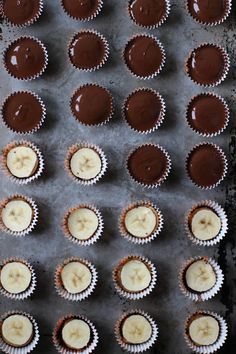 chocolate and banana cupcakes on a baking sheet ready to be baked in the oven