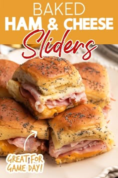 ham and cheese sliders on a plate with text overlay that reads, baked ham and cheese sliders great for game day