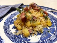 a blue and white plate with food on it