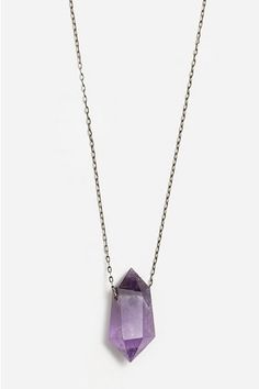 A powerful healing stone, this hand selected amethyst crystal rests on a 22 sterling silver chain. Amethyst has been celebrated throughout the centuries for it s beautiful lavender hue and ability to bring forth the purest aspirations of the wearer. It is thought to enhance intuition, while also calming the mind and spirit. We love amethyst as a stone to wear or hold during morning meditation or quiet, grounding moments in your day. Note: each stone is one-of-a-kind so there may be slight variat Amethyst Jewelry Necklace, Amethyst Dragon, Geode Necklace, Tomboy Chic, Morning Meditation, Gemstone Meanings, Purple Necklace, Amethyst Geode, Fashion Aesthetics