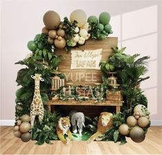 an animal themed birthday party with jungle decorations