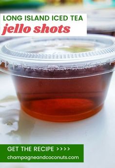 a plastic container filled with jello shots sitting on top of a white countertop