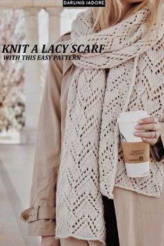 a woman holding a coffee cup and wearing a knit lacy scarf with the text knitting pattern