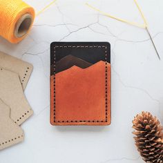 Leather Mountain Card Holder in use hand dyed in brown and black Card Holder Leather Handmade, Business Leather Card Holder With Coin Pocket, Handmade Artisan Leather Card Holder, Mountain Card, Money Clip Leather Wallet, Leather Trend, Leather Travel Wallet, Leather Money Clips, Leather Wallet Pattern