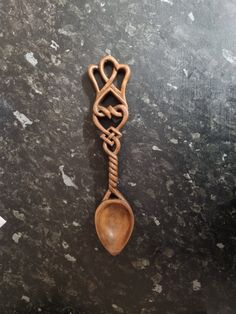 a wooden spoon sitting on top of a counter