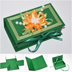 an origami flower is placed on top of a green box with ribbon and pearls